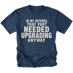 Navy t-shirt featuring the Needed Upgrading design on the front by Trail Snark.