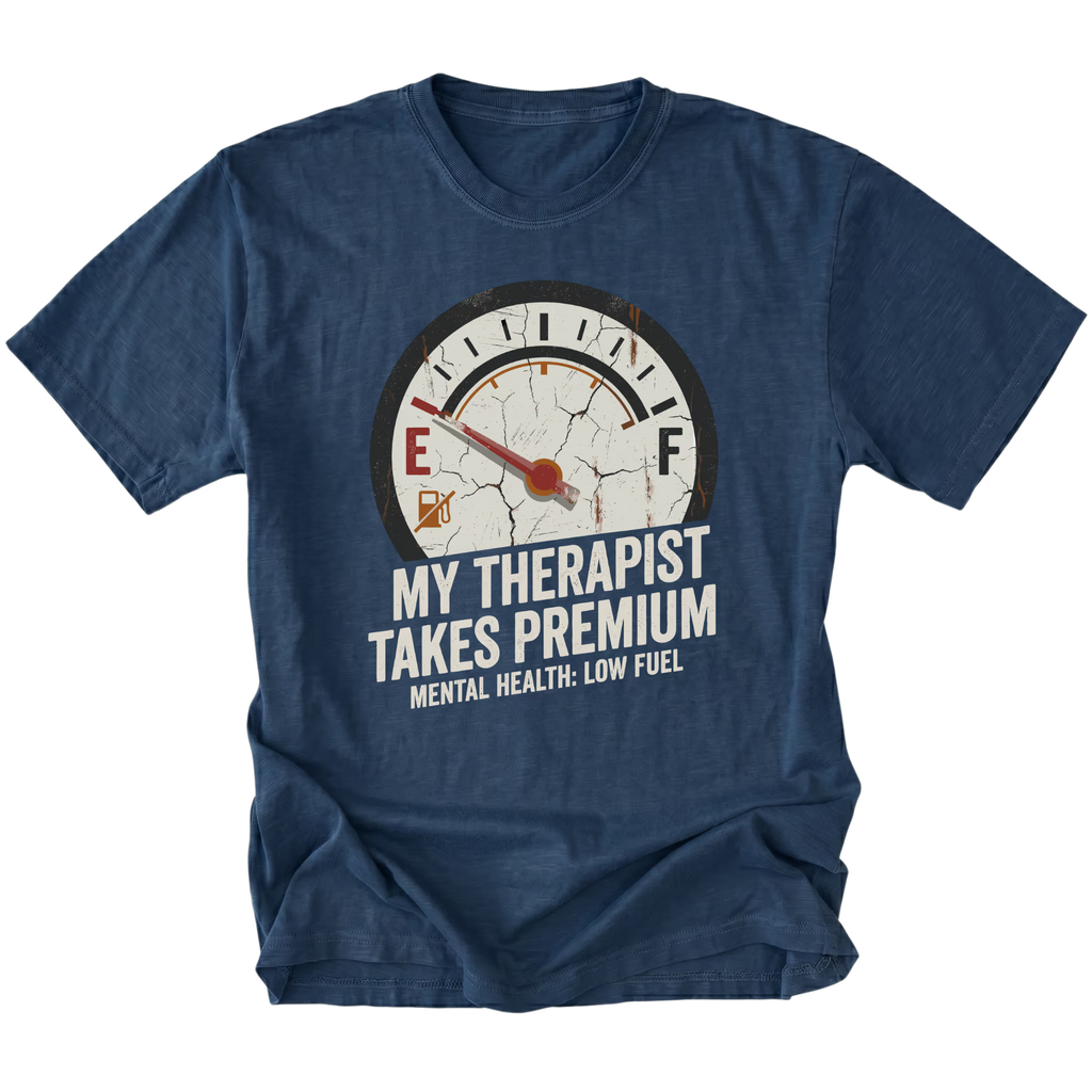 Navy t-shirt with distressed fuel gauge graphic pointing near empty and text reading My Therapist Takes Premium with Mental Health Low Fuel by Trail Snark.