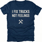 Navy t-shirt with bold distressed text reading I Fix Trucks Not Feelings and crossed wrench and hammer icon.