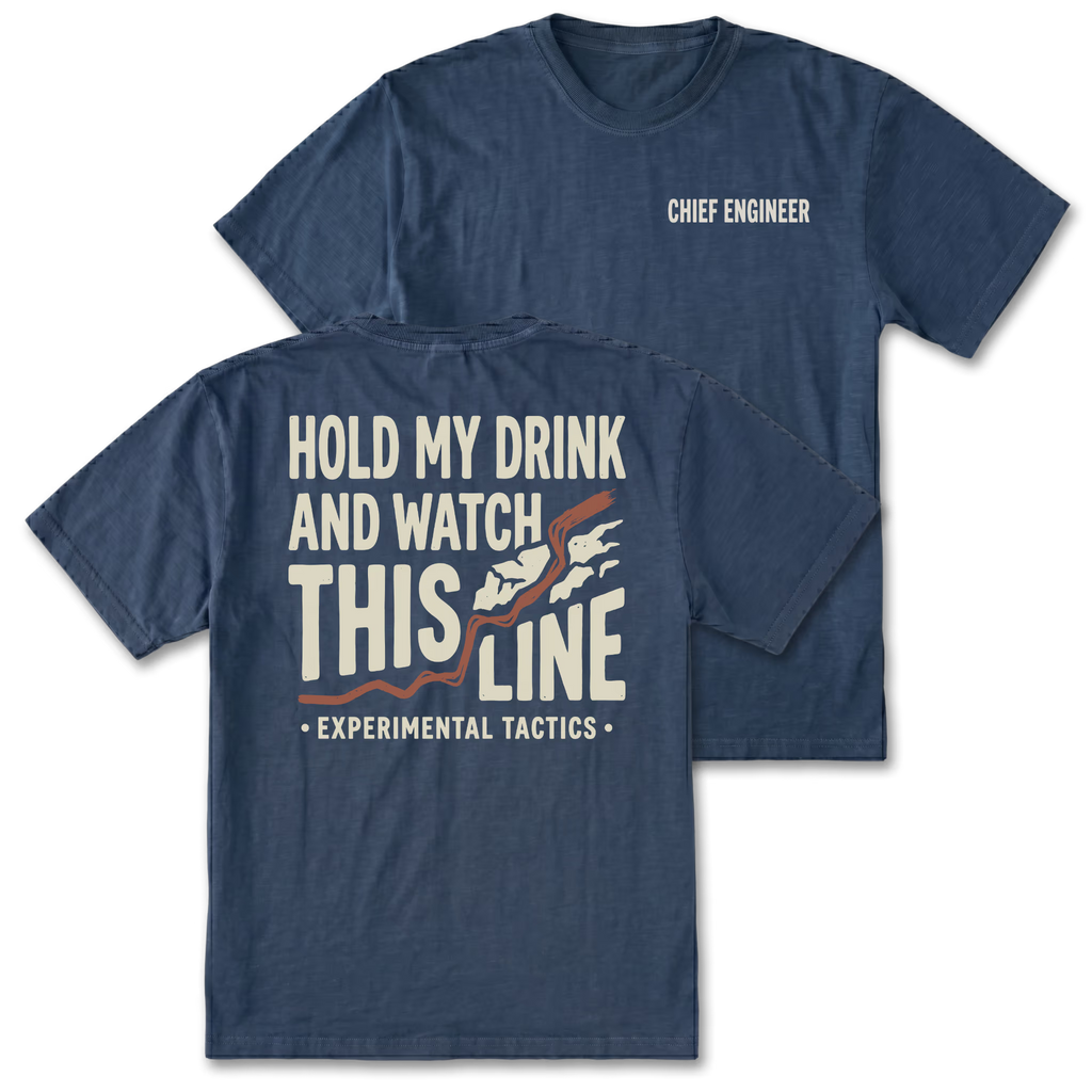 Two navy blue t-shirts shown on a white background, displaying both the front and back designs. The front shirt features the text 'CHIEF ENGINEER' in white on the left chest. The back features the text 'HOLD MY DRINK AND WATCH THIS LINE' and smaller text 'EXPERIMENTAL TACTICS' under.