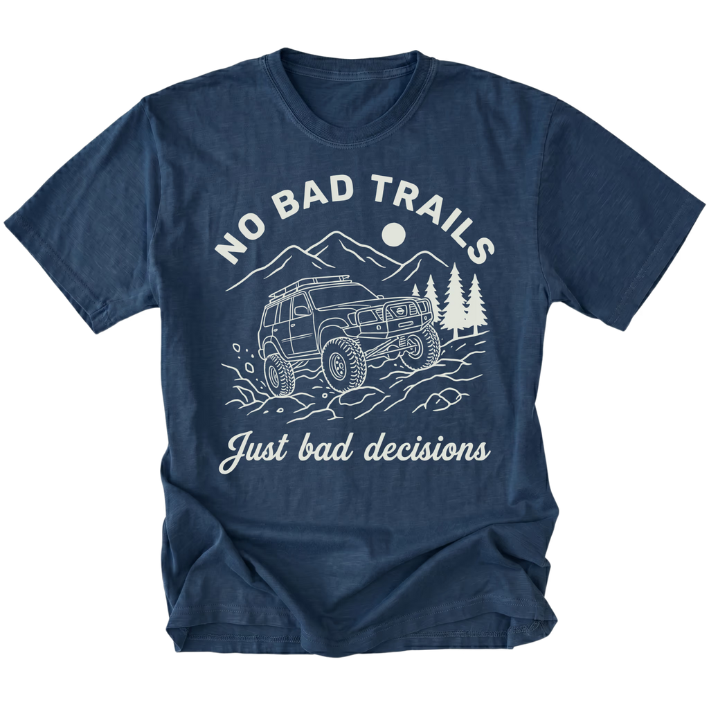 Navy t-shirt featuring an off-road SUV climbing rocks with text reading No Bad Trails Just Bad Decisions, front view by Trail Snark.