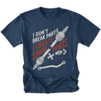 A navy blue short-sleeve t-shirt with a graphic print of a car steering column and parts, featuring the text 'I DON'T BREAK PARTS I CREATE SPARE PARTS' in white and orange lettering, shown on a plain white background.