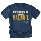 Navy T-shirt featuring the Barely Making It recovery hook design on the front by Trail Snark.